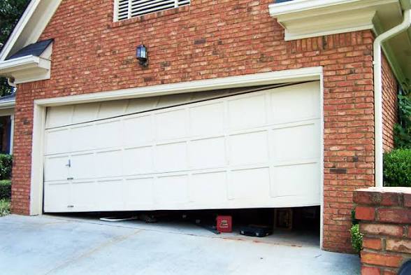 Garage door repair service van responding at night