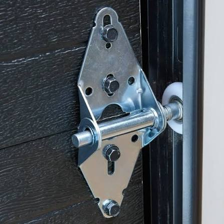 New nylon garage door rollers ready for installation